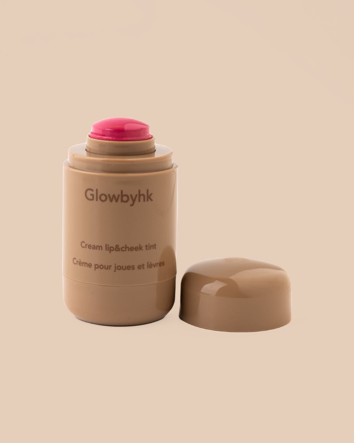 Pink Tan Cream Blush on warm beige background